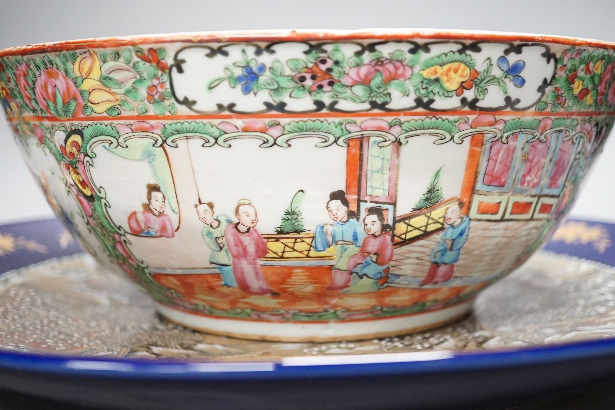 A late 19th century famille rose bowl and a Chinese porcelain dish, bowl 30 cms diameter.